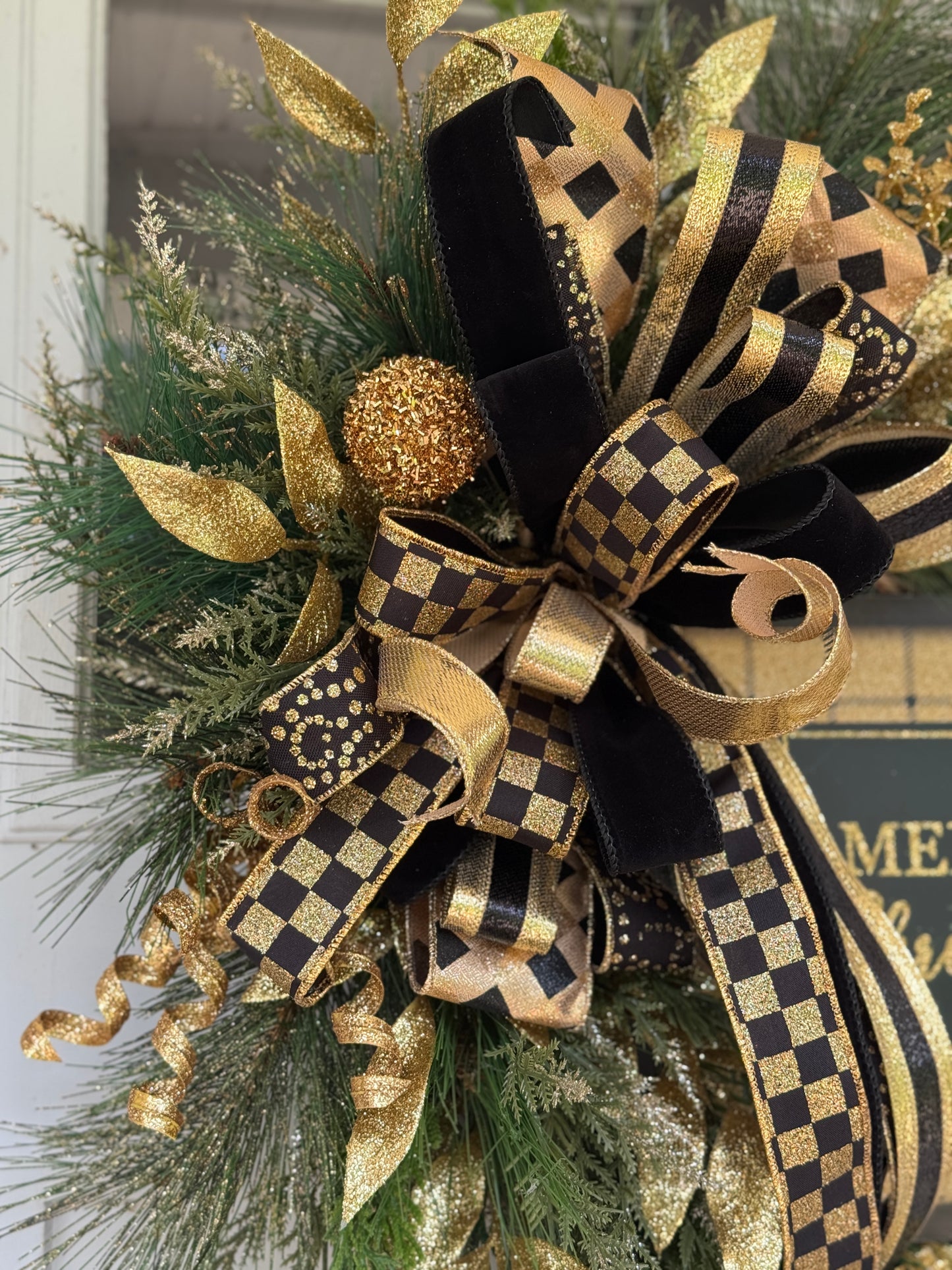 Elegant Gold and Black Holiday Wreath