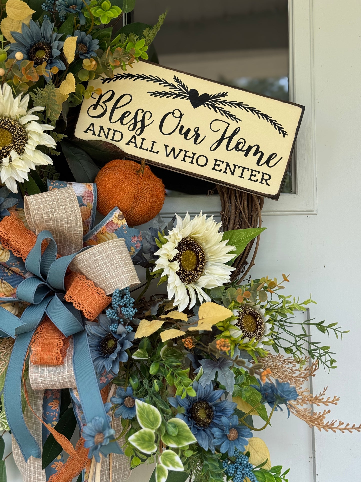 Floral Wreath with Sunflowers and Blue Accents