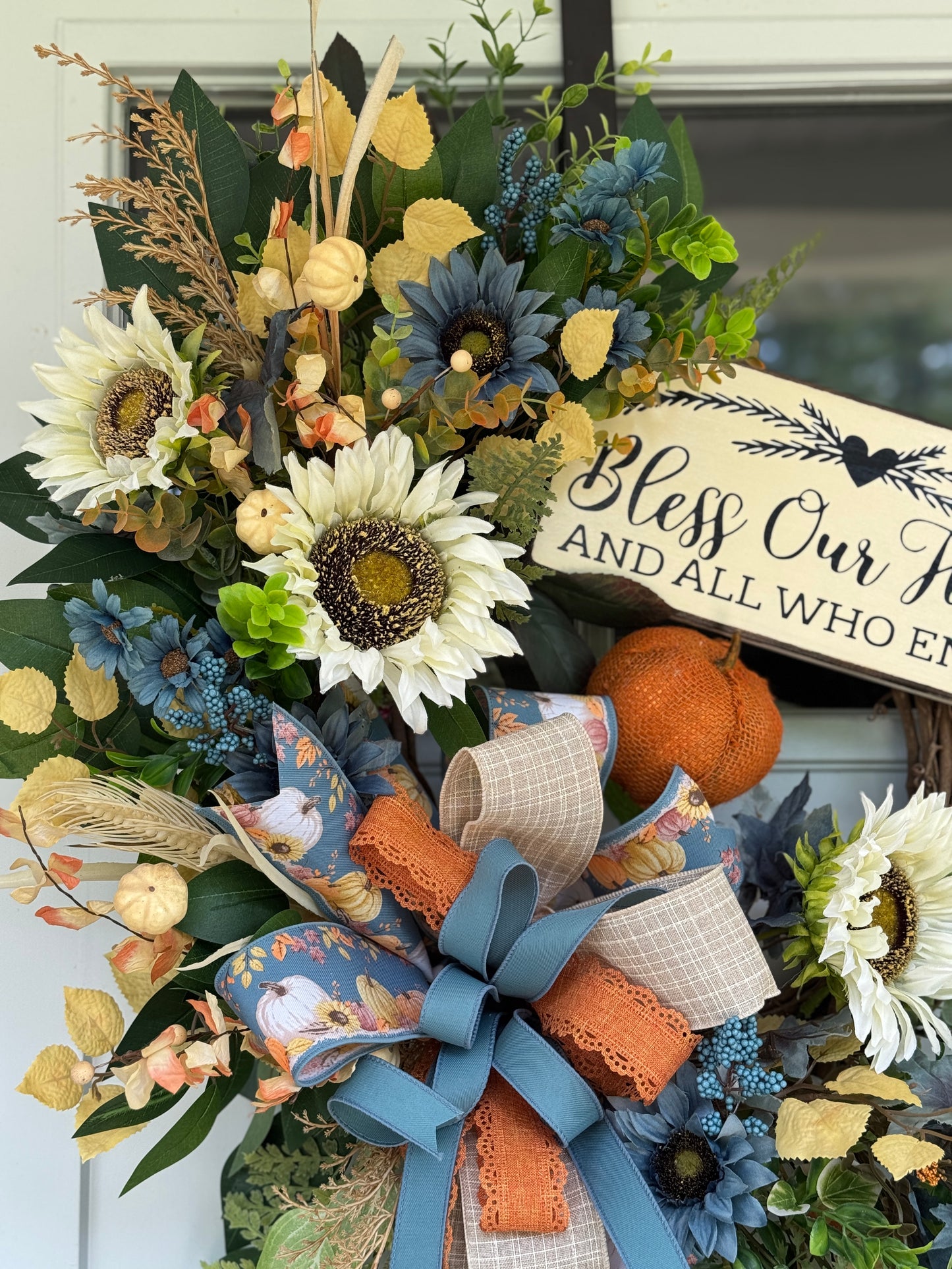 Floral Wreath with Sunflowers and Blue Accents