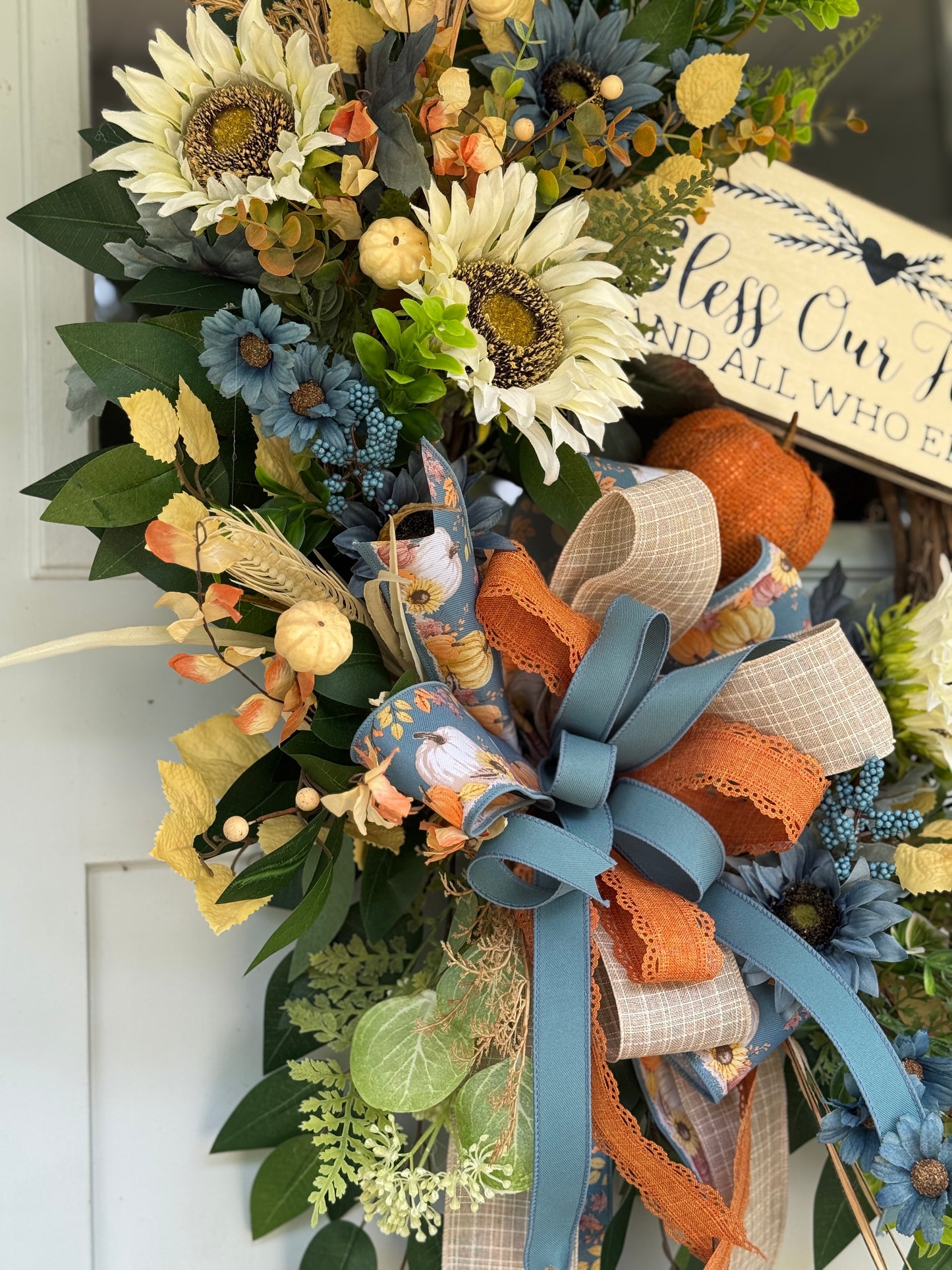 Floral Wreath with Sunflowers and Blue Accents