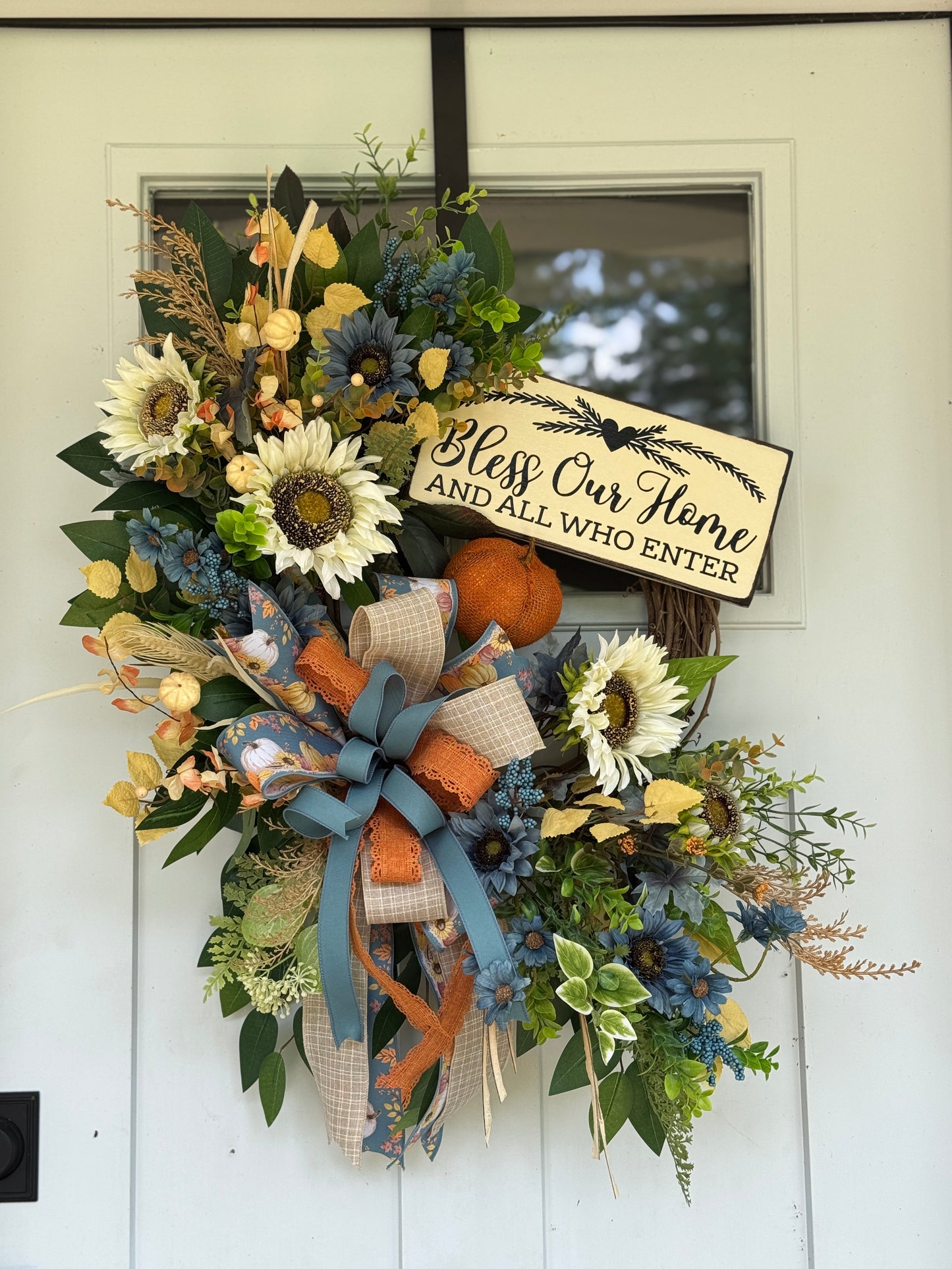 Floral Wreath with Sunflowers and Blue Accents