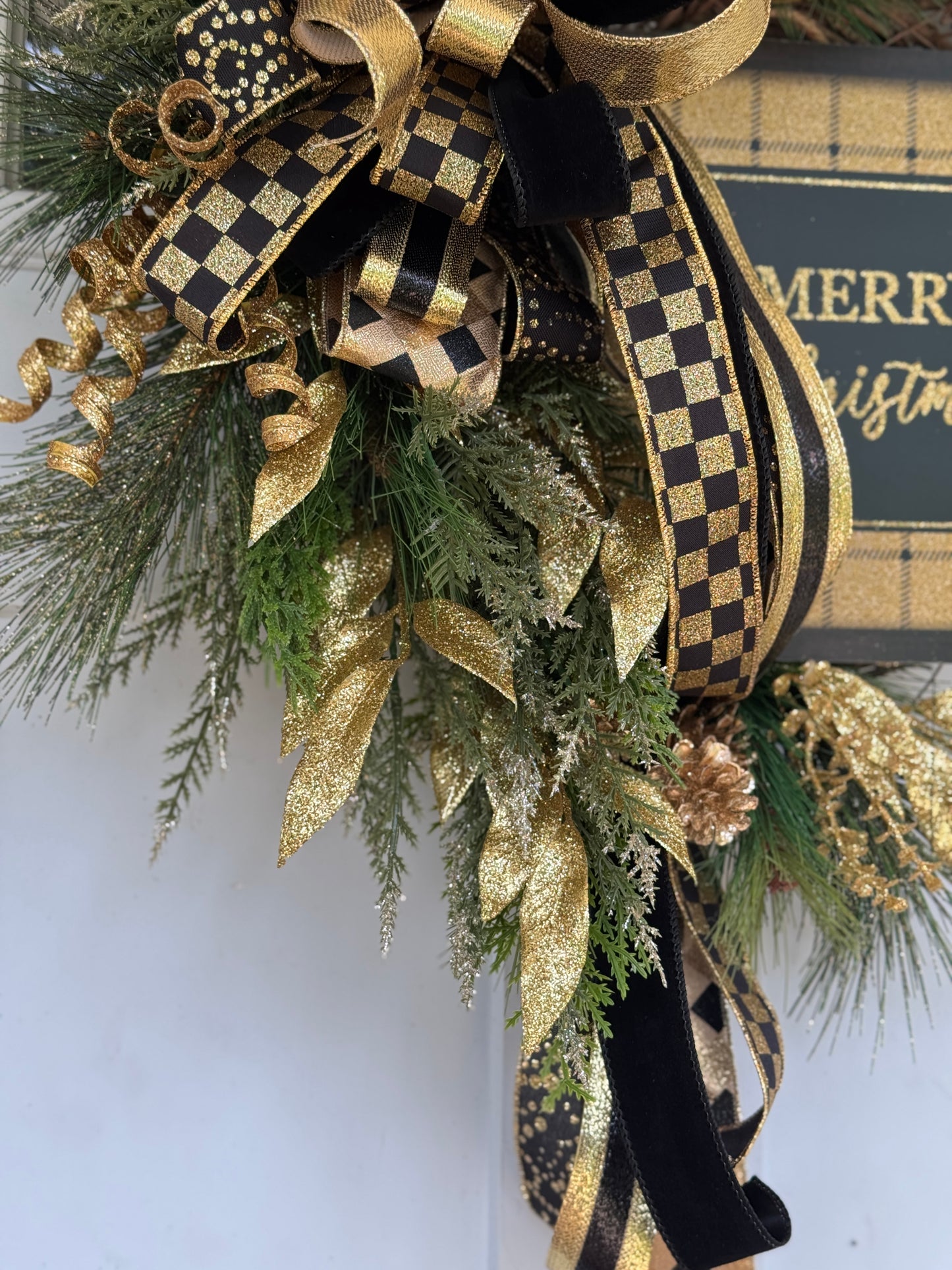 Elegant Gold and Black Holiday Wreath