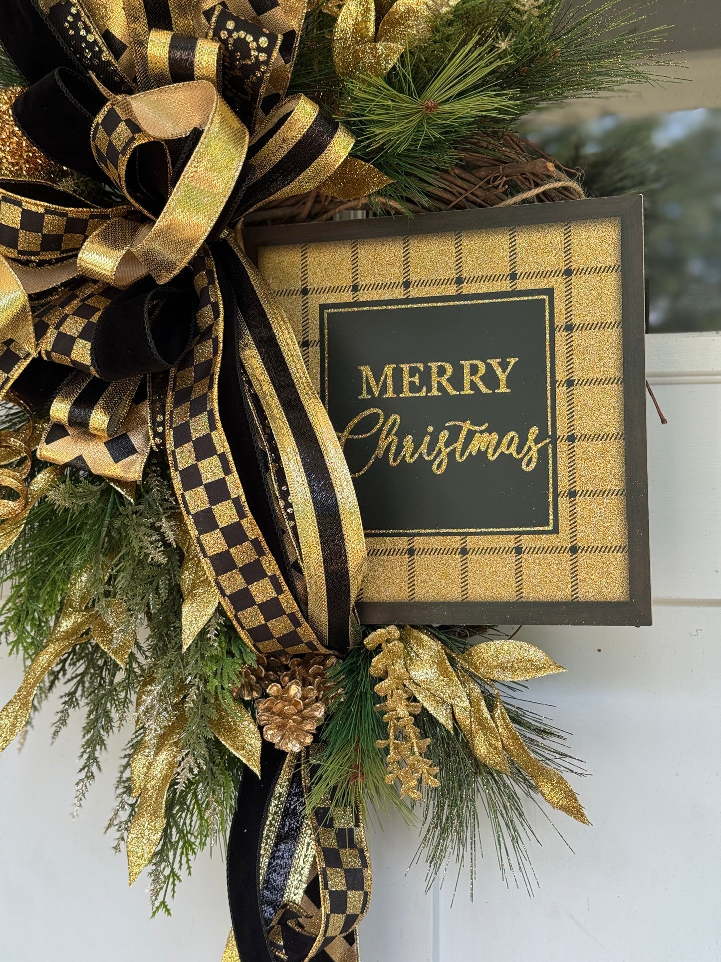 Elegant Gold and Black Holiday Wreath