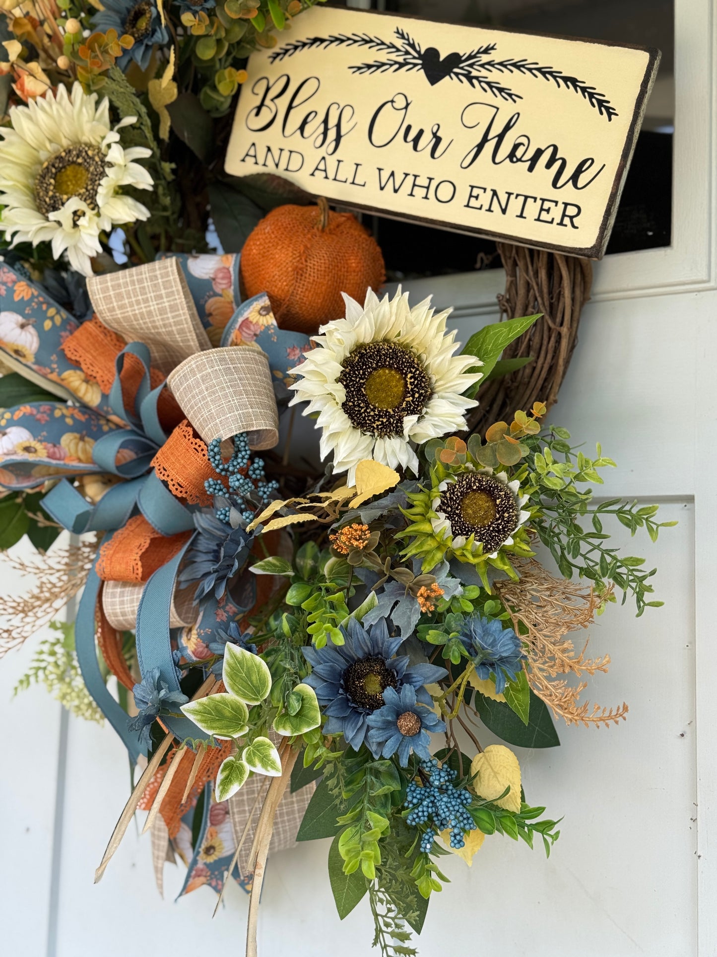 Floral Wreath with Sunflowers and Blue Accents