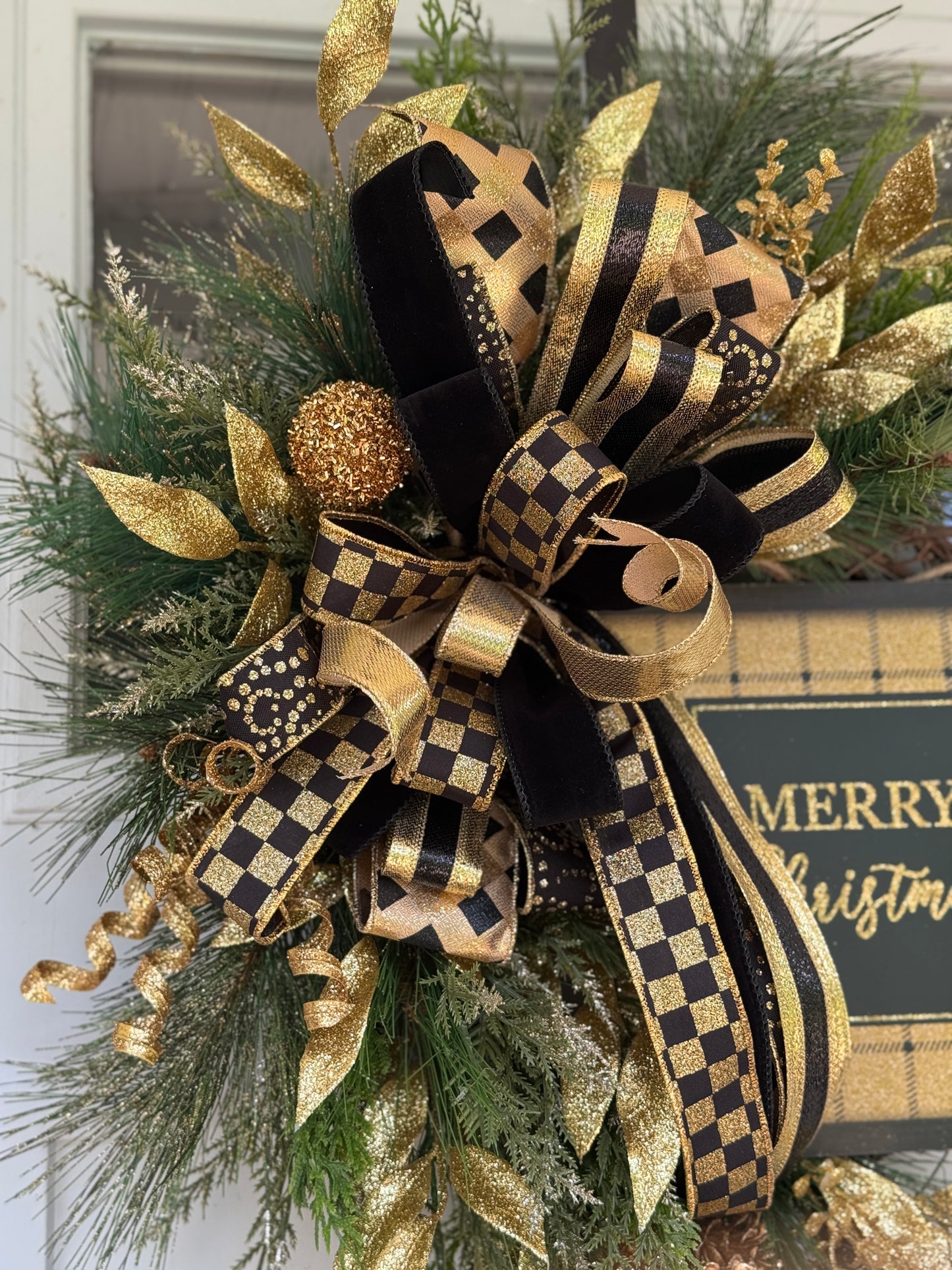 Elegant Gold and Black Holiday Wreath