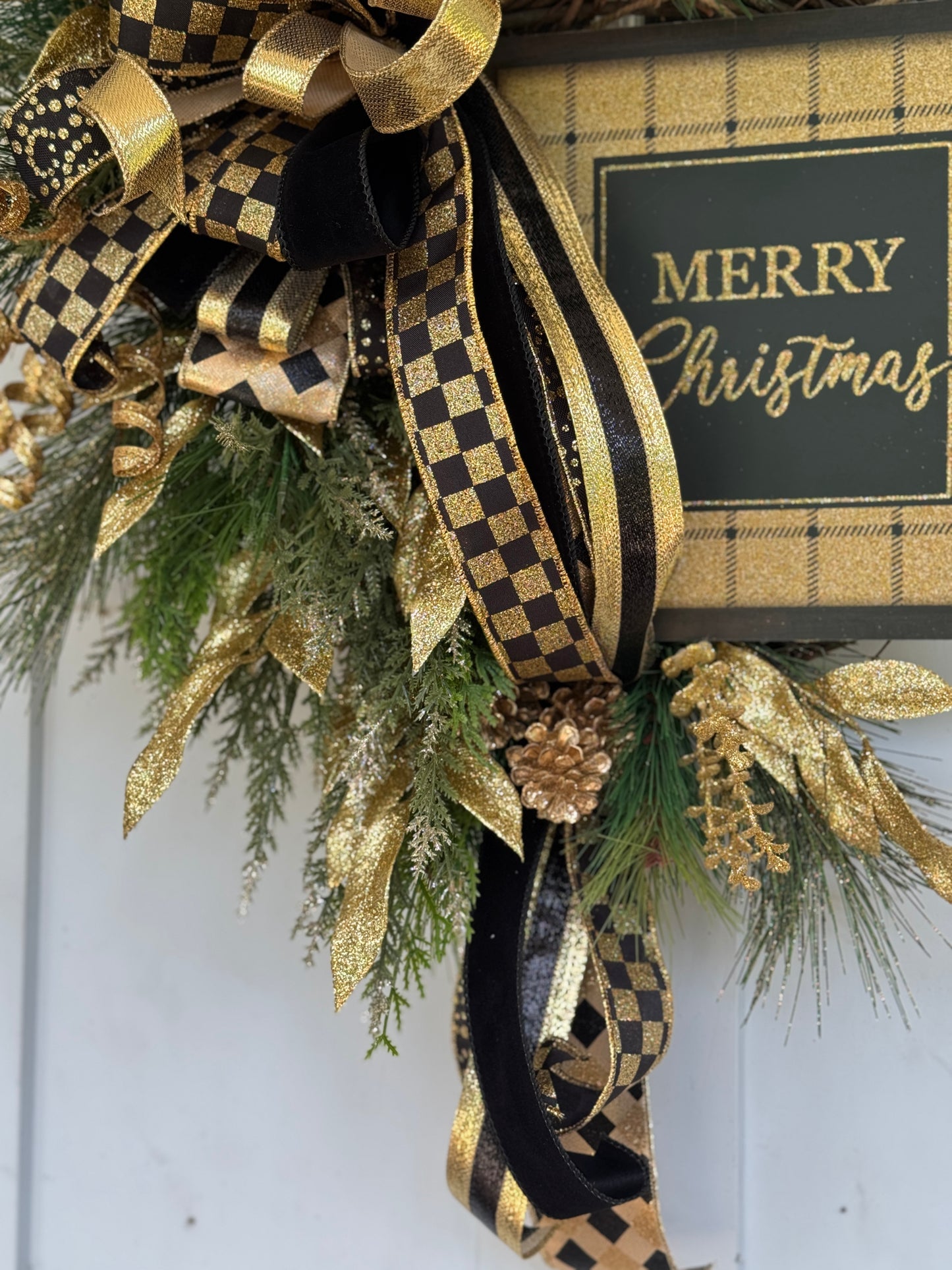 Elegant Gold and Black Holiday Wreath