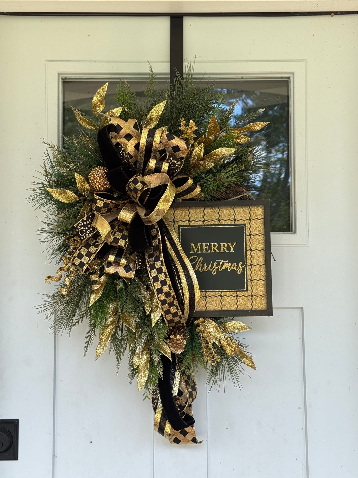 Elegant Gold and Black Holiday Wreath
