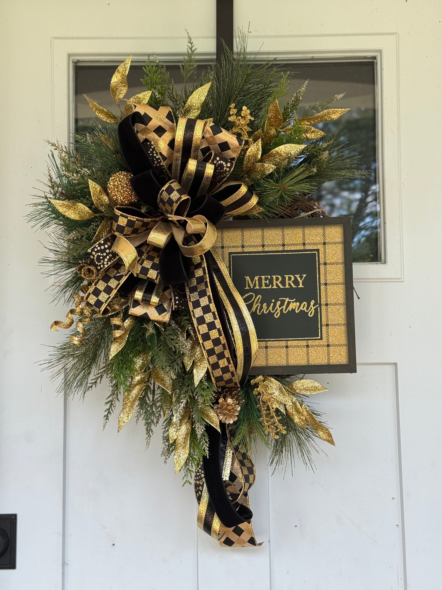 Elegant Gold and Black Holiday Wreath