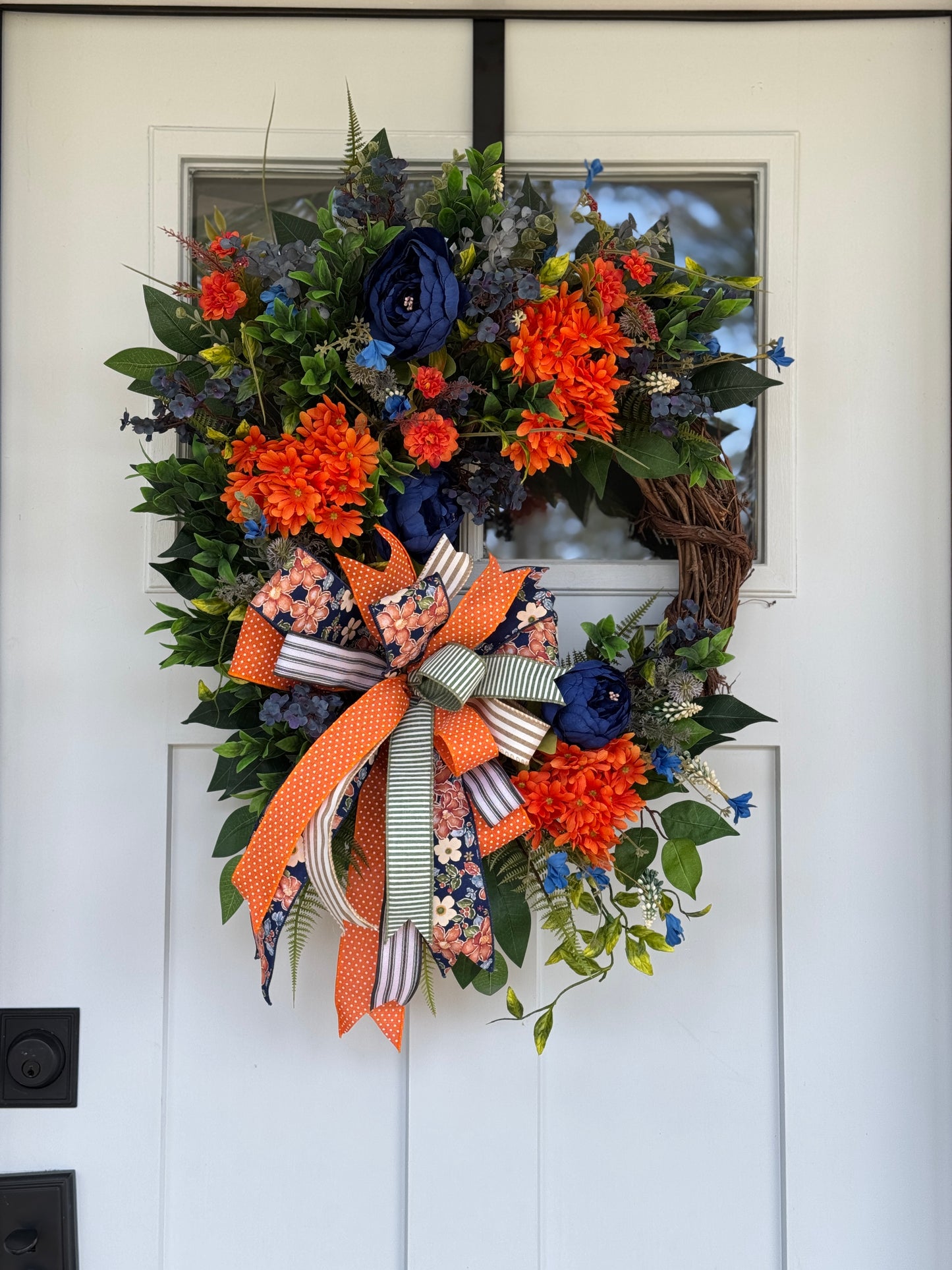 Vibrant Navy and Orange Floral Wreath