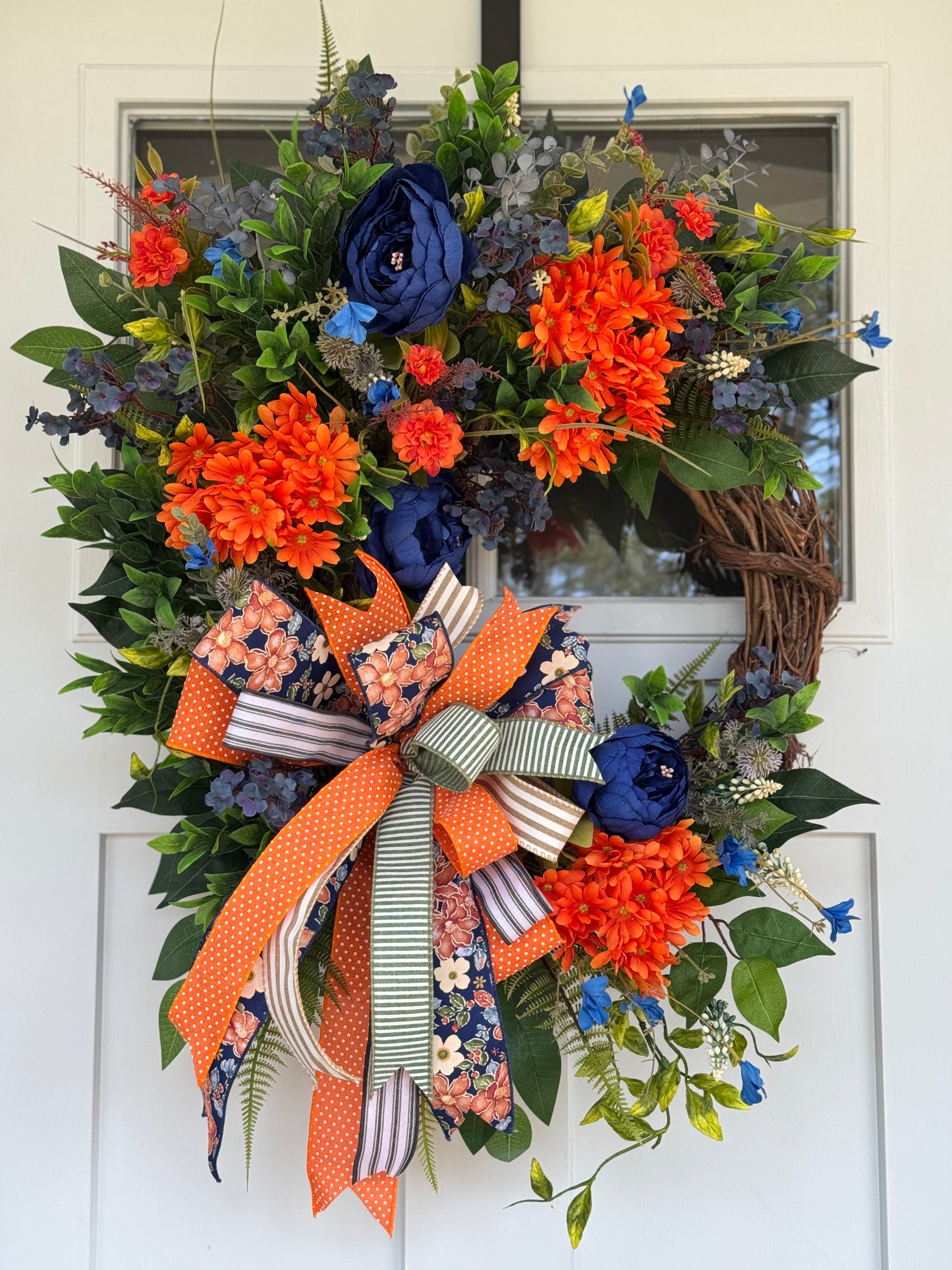 Vibrant Navy and Orange Floral Wreath