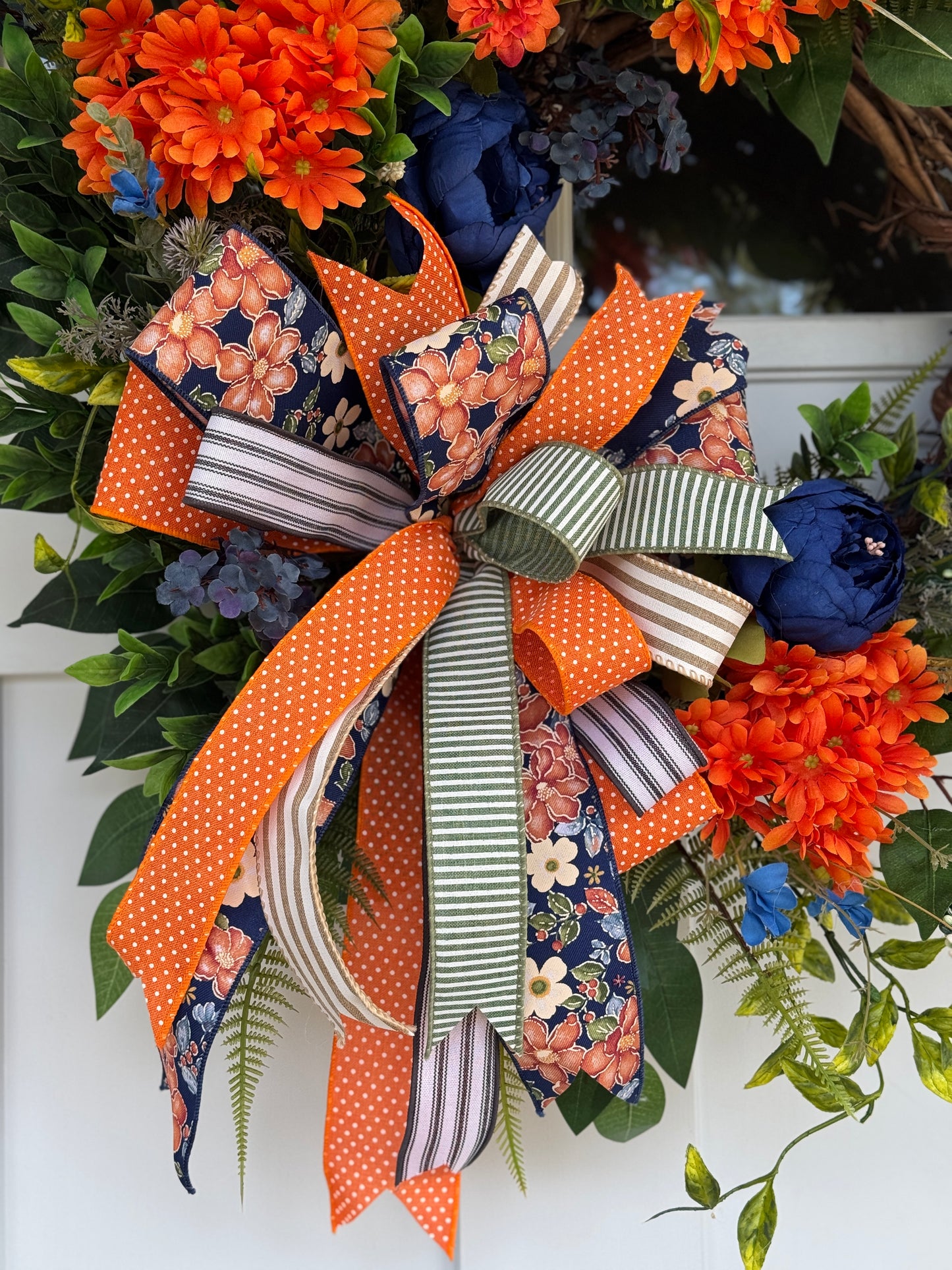 Vibrant Navy and Orange Floral Wreath