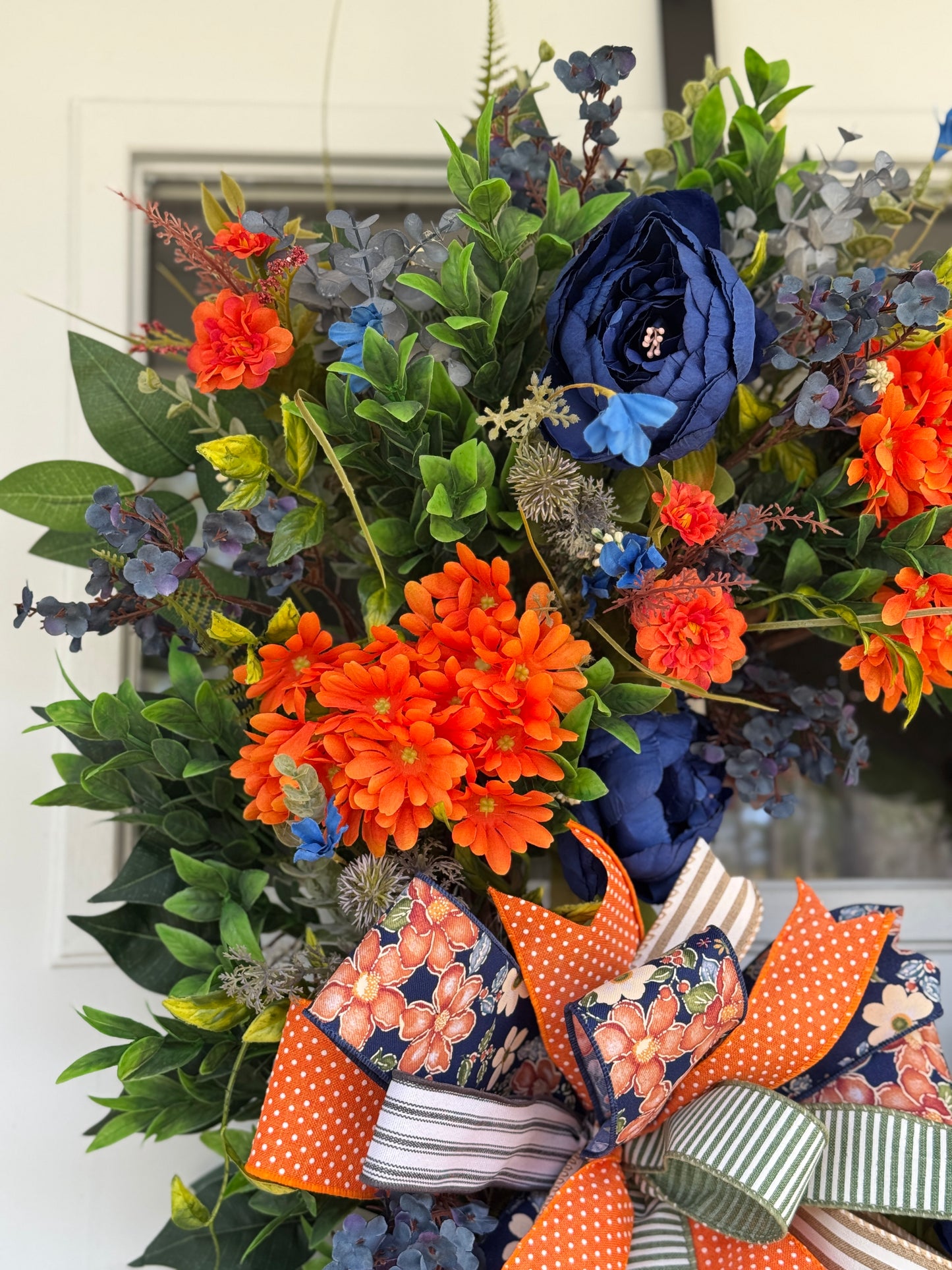 Vibrant Navy and Orange Floral Wreath