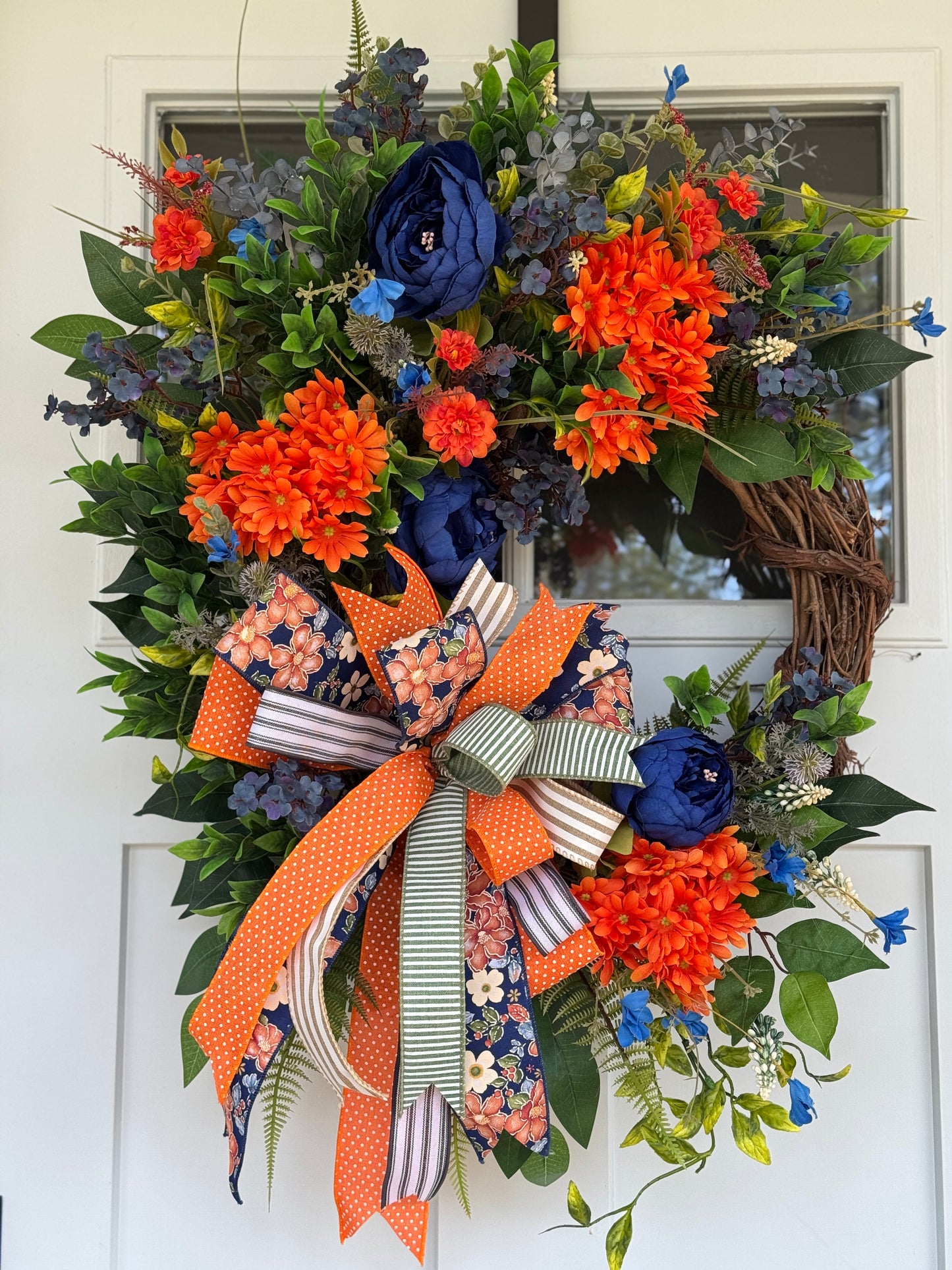 Vibrant Navy and Orange Floral Wreath